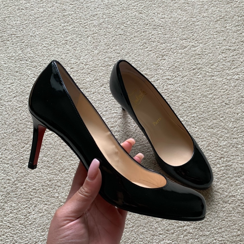 women’s christian louboutin black pumps